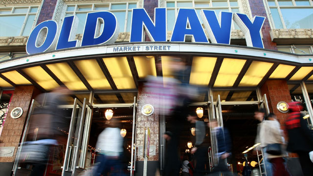 PHOTO: Pedestrians walk by an Old Navy store in San Francisco, California.
