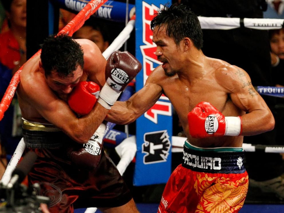 PHOTO: Manny Pacquiao of the Philippines fights Oscar De La Hoya during their welterweight match at the MGM Grand Garden Arena, Dec. 6, 2008 in Las Vegas, Nev.