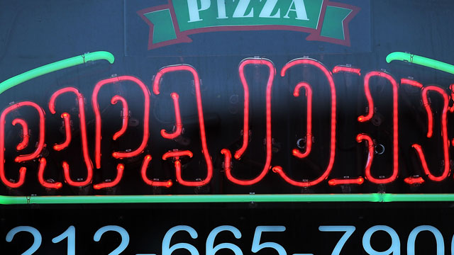 PHOTO: A sign hangs in the window of a Papa Johns pizza restaurant, August 9, 2012 in New York City.