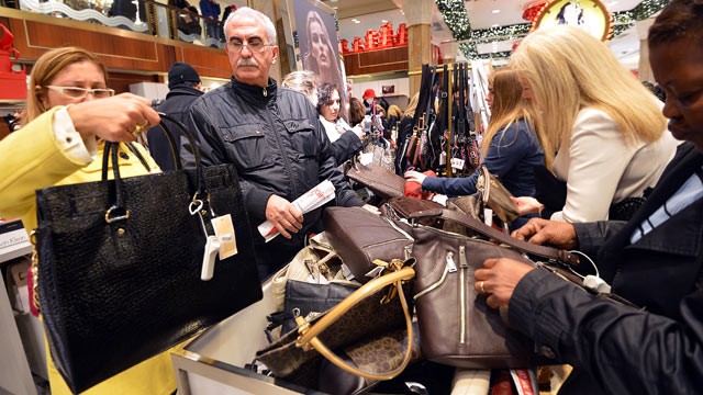 PHOTO: People shop on the first floor of Macy's department store, Nov. 23, 2012 in New York.