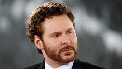 PHOTO: Sean Parker, co-founder of Napster Inc. and managing partner of the Founders Fund, listens during a television interview on day three of the World Economic Forum (WEF) in Davos, Switzerland, Jan. 27, 2012.