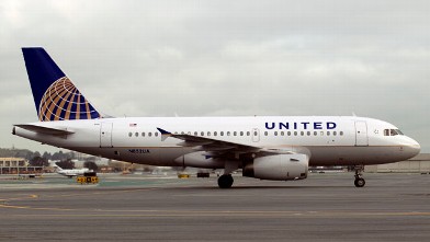 PHOTO: An Airbus A319 jet painted in United Continental Holdings Inc.'s new livery following the airlines' merger taxis down the runway at San Francisco International Airport in San Francisco, California, U.S., on Feb. 23, 2011.