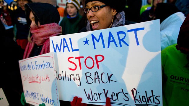PHOTO: Workers and supporters march outside a local Wal-Mart retail store on Black Friday, Nov. 23, 2012 in Milwaukee, Wisc.