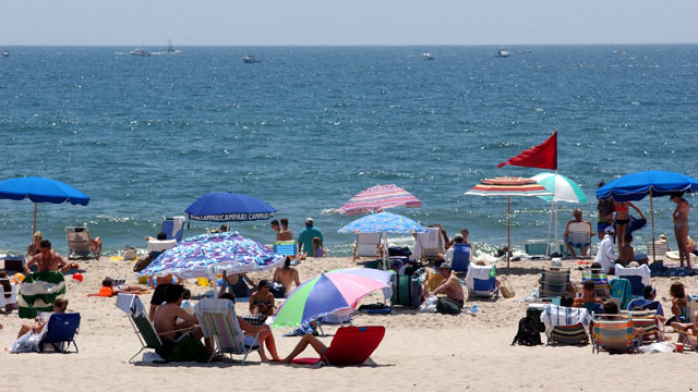 PHOTO: People enjoy a day at the beach in this July 22, 2001 file photo of Southampton, NY. The Hamptons, located at the east end of New York's Long Island, is a traditional summer escape for New Yorkers.
