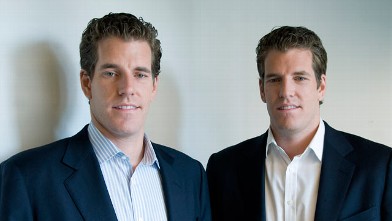 PHOTO: Cameron Winklevoss, left, and his brother, Tyler, stand for a portrait after a television interview in New York, Oct. 7, 2010.