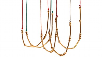 PHOTO: Histoire Lucky Morse Code necklace.