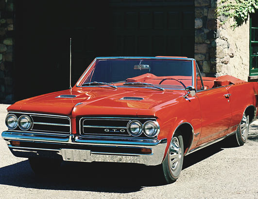 With a powerful engine in a midsize car body, the 1964 Pontiac GTO was 