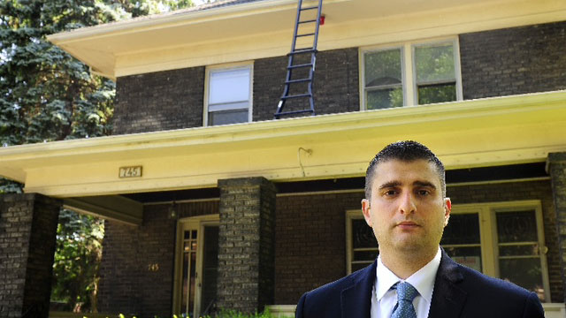 PHOTO: Niagara Falls Director of Community Development Seth Piccirillo stands in front of a house in on Fourth Street in Niagara Falls, June 10, 2012.