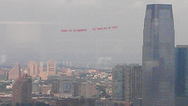 PHOTO: A plane flew over S&P headquarters trailing a banner that read, "Thanks for the downgrade, you should all be fired."