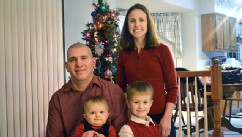 PHOTO: Daniel Herrmann, pictured with his family, is suing his former employer, Bank of America, saying they did not accommodate his disabled right leg, arm and hand.