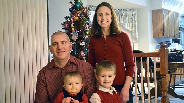 PHOTO: Daniel Herrmann, pictured with his family, is suing his former employer, Bank of America, saying they did not accommodate his disabled right leg, arm and hand.