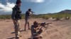 PHOTO: Tim Ralston trains his children in the use of firearms so they are prepared for doomsday.