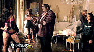 Photo: GoDaddys Lola Banned From Super Bowl: Commercial features effeminate football player designing lingerie.