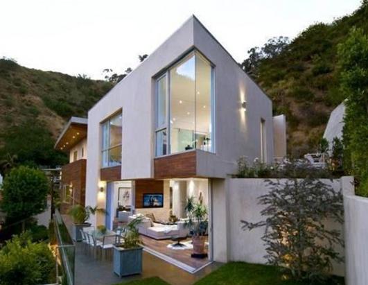 Hugh Buys Home for Wife