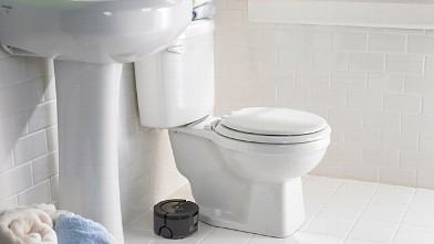 PHOTO: iRobot?s floor-washing Scooba 230 washes, scrubs and squeegees floors.