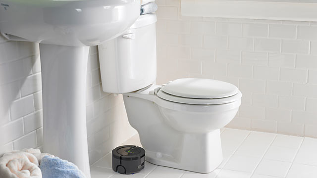 PHOTO: iRobot?s floor-washing Scooba 230 washes, scrubs and squeegees floors.