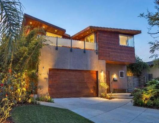 Hefner Buys Wife Home for $5M