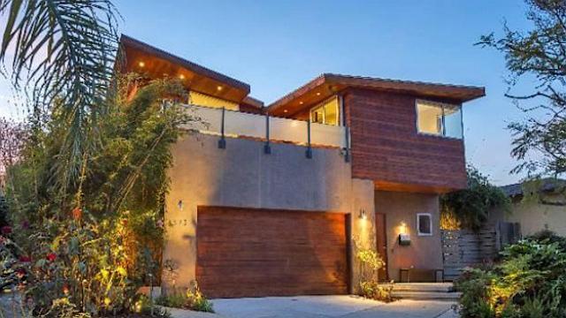 Hefner Buys Wife Home for $5M
