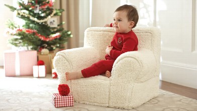 PHOTO: Red reindeer one piece jumper and my first anywhere chair Sherpa from Pottery Barn Kids.