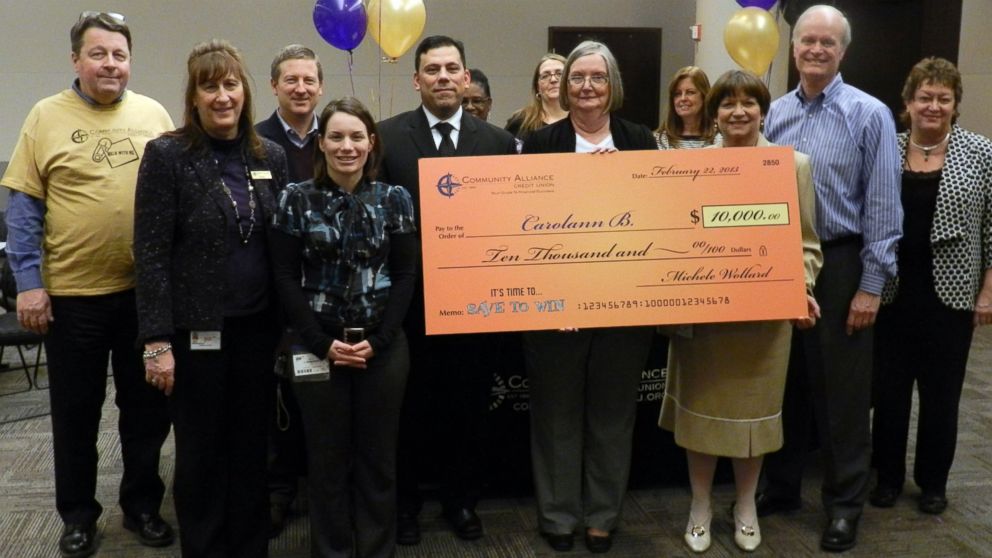 PHOTO: The Save to Win Prize Patrol visited Community Alliance Credit Union in Dearborn, Mich., to present a $10,000 check to one of the Save to Win Grand Prize winners.