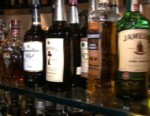 VIDEO: State investigators accuse bars, restaurants of selling cheap liquor in premium brand bottles.