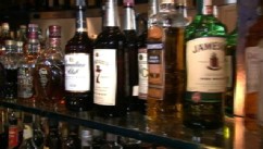 VIDEO: State investigators accuse bars, restaurants of selling cheap liquor in premium brand bottles.