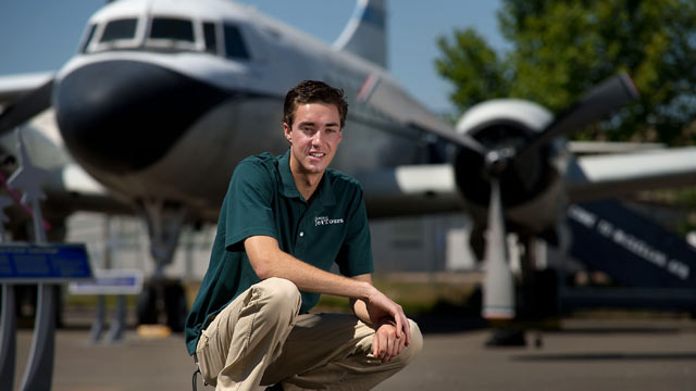 PHOTO: Sean Burris 18, is shown in front of a Convair VC-131D at the Aerospace Museum of California in North Highlands, May 24, 2013.