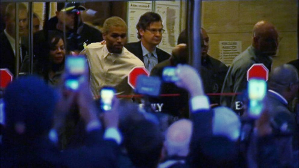 PHOTO: Chris Brown is seen leaving court, Oct. 28, 2013.