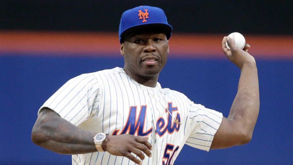 PHOTO: 50 Cent throws out the ceremonial first pitch before a baseball game between the New York Mets and the Pittsburgh Pirates, May 27, 2014, in New York.