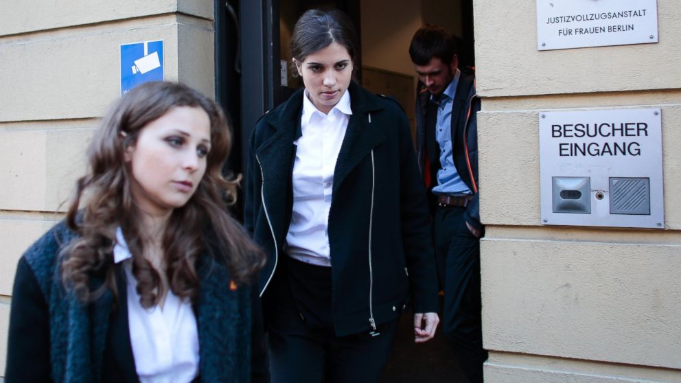 PHOTO: Nadezhda Tolokonnikova, center, and Maria Alekhina, left, members of Russian punk band Pussy Riot, leave after a visit to the womens prison at the district Lichtenberg in Berlin, Germany, Tuesday, Feb. 11, 2014.