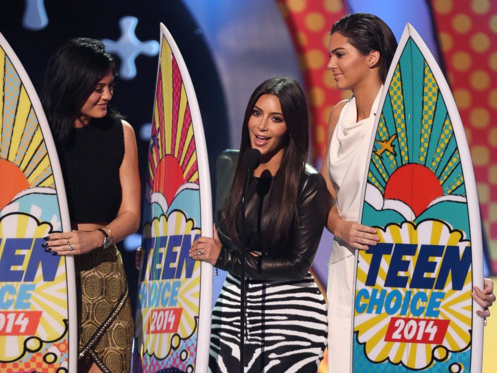 PHOTO: Kylie Jenner, left, Kim Kardashian, center, and Kendall Jenner accept the award for choice reality show for Keeping Up with the Kardashians at the Teen Choice Awards at the Shrine Auditorium, Aug. 10, 2014, in Los Angeles.