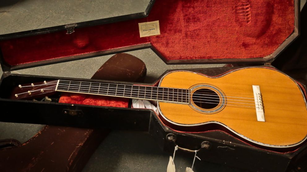 PHOTO: A 1893 Martin guitar in a "coffin" case is unveiled during a press preview, March 5, 2014 in New York.