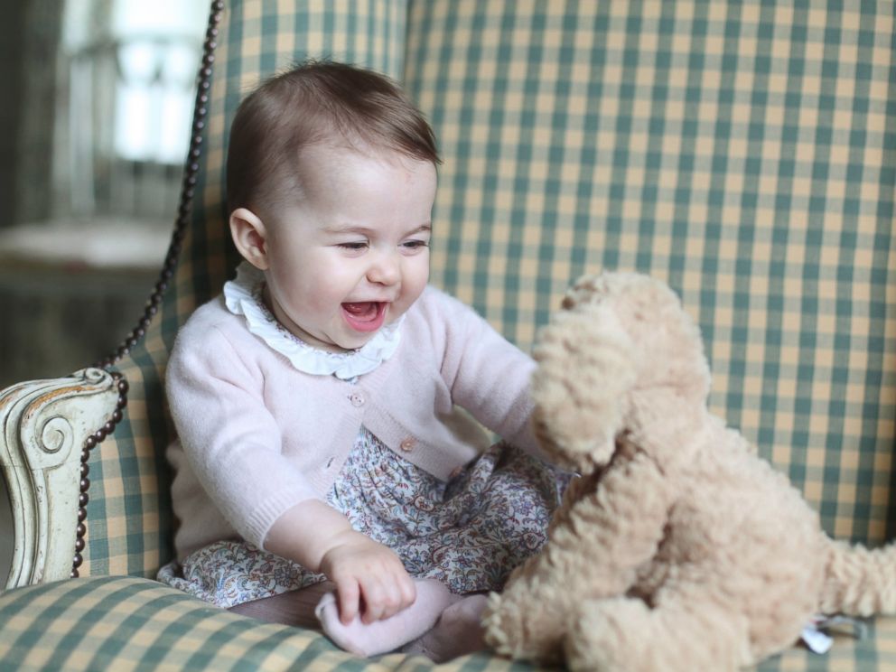 PHOTO: This undated photo released Nov. 29, 2015, by Britains Duke and Duchess of Cambridge, shows Princess Charlotte with her cuddly toy dog, at Anmer Hall in Sandringham, England.