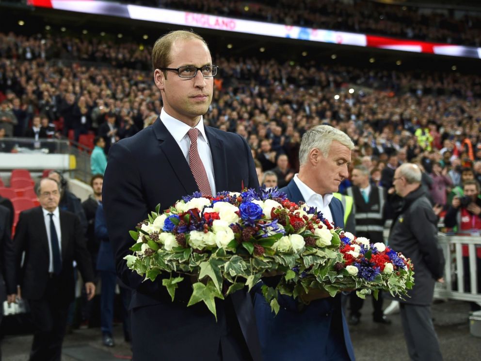 PHOTO: Prince William, The Duke of Cambridge holds the floral tribute during the International Friendly match between England and France at Wembley Stadium, on Nov. 17, 2015, in London.