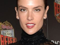 PHOTO: Alessandra Ambrosio posted this image of her as a toddler to Instagram, July 25, 2013. | Alessandra Ambrosio attends Rolling Stone hosts Bacardi Rebels, May 20, 2013 in New York City.