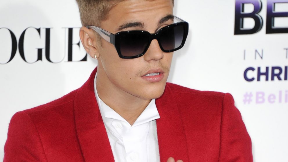 PHOTO: Justin Bieber attends the premiere of Open Road Films Justin Biebers Believe at Regal Cinemas L.A. Live, Dec. 18, 2013 in Los Angeles, Calif.