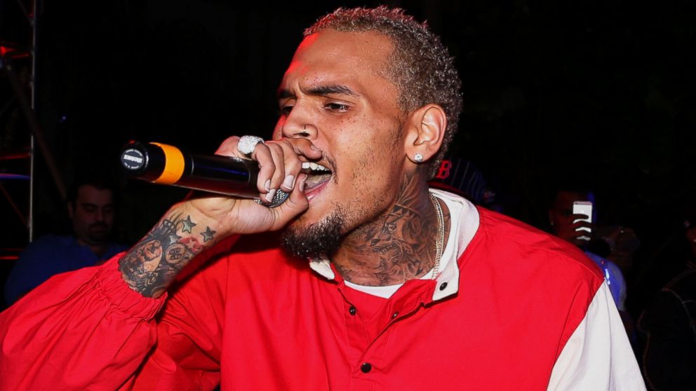 PHOTO: Chris Brown performs at The Pool After Dark at Harrahs Resort, Oct. 25, 2013 in Atlantic City, N.J.