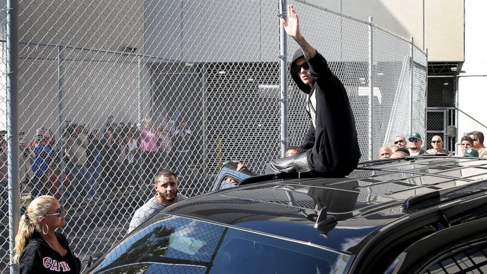 PHOTO: Justin Bieber waves after exiting from the Turner Guilford Knight Correctional Center, Jan. 23, 2014, in Miami.