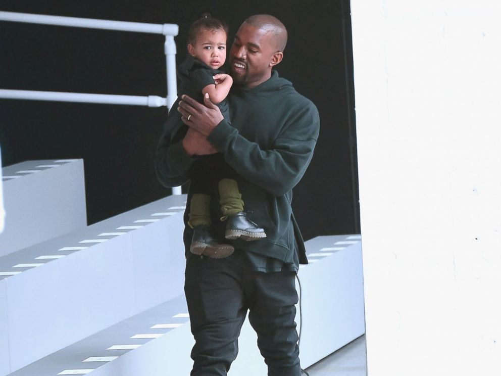 PHOTO: Kanye West and North West attend the adidas show during Mercedes-Benz Fashion Week Fall 2015 at Skylight Clarkson Sq., Feb. 12, 2015, in New York.