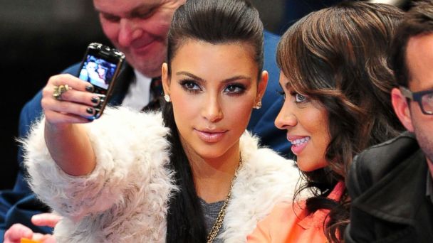 Kim Selfie GTY kim kardashian phone nt 131018 16x9 608 Kim Kardashians 33 Best Tweets #NoFilter