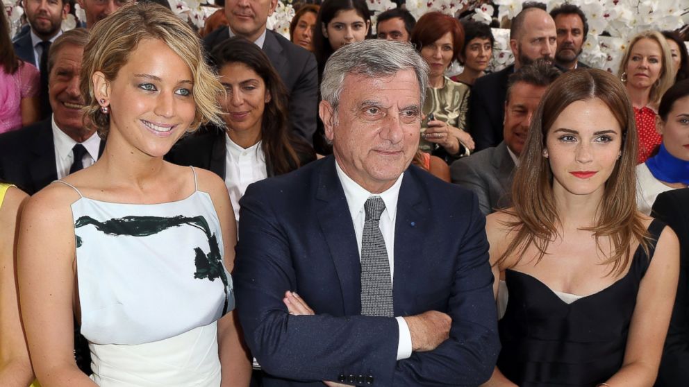 PHOTO: Jennifer Lawrence, Sidney Toledano and Emma Watson attend the Christian Dior show as part of Paris Fashion Week - Haute Couture Fall/Winter 2014-2015 at Muse Rodin, July 7, 2014, in Paris.