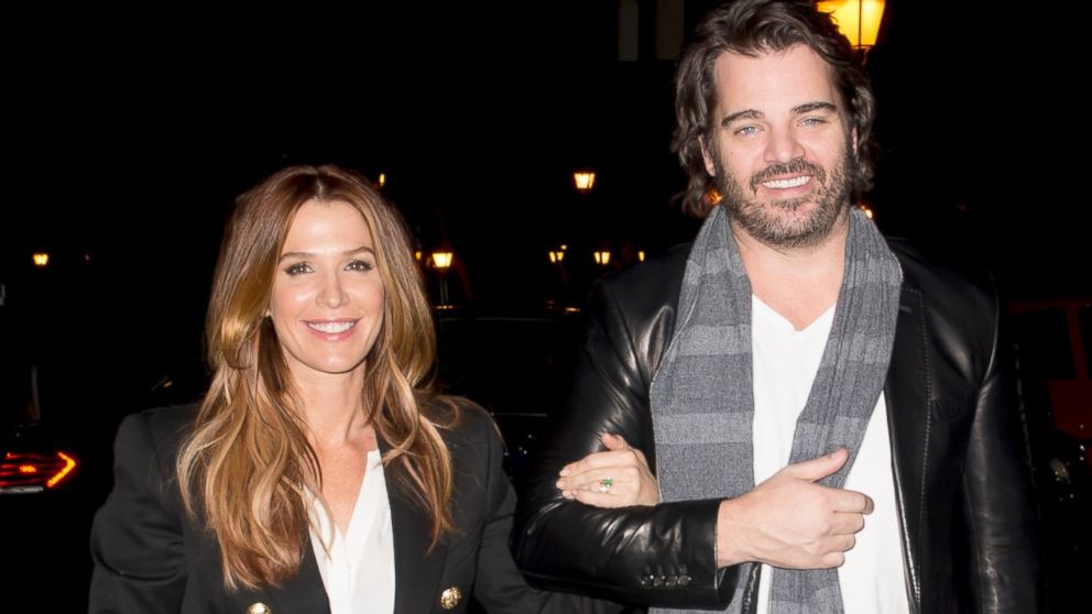 PHOTO: Poppy Montgomery and Shawn Sanford arrive at El Lando restaurante, Dec. 17, 2013, in Madrid.