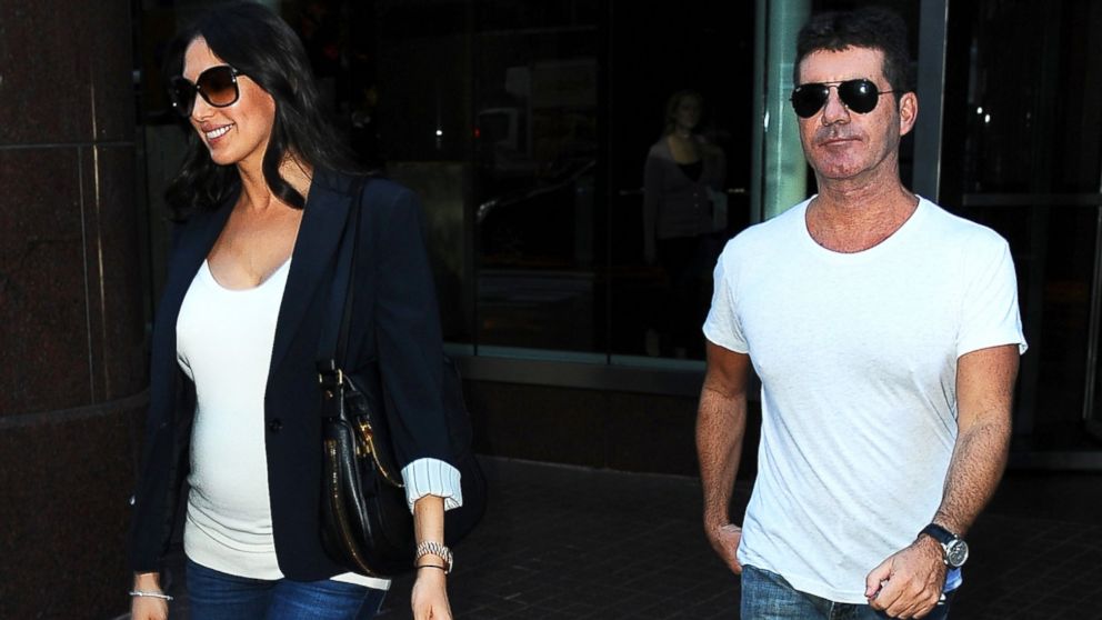 PHOTO: Lauren Silverman and Simon Cowell are seen in Soho, Sept. 19, 2013 in New York City.