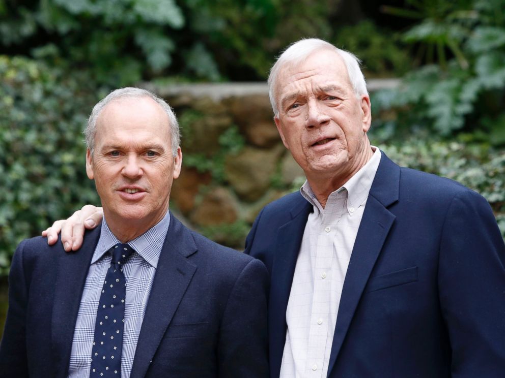 PHOTO: Michael Keaton and journalist Walter Robinson, right, attenda photocall to present the movie Spotlight, Jan. 23, 2016, in Rome.