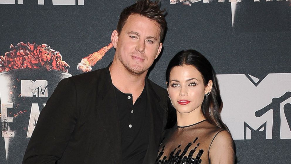 PHOTO: Channing Tatum and actress Jenna Dewan-Tatum pose in the press room at the 2014 MTV Movie Awards at Nokia Theatre L.A. Live, April 13, 2014, in Los Angeles.