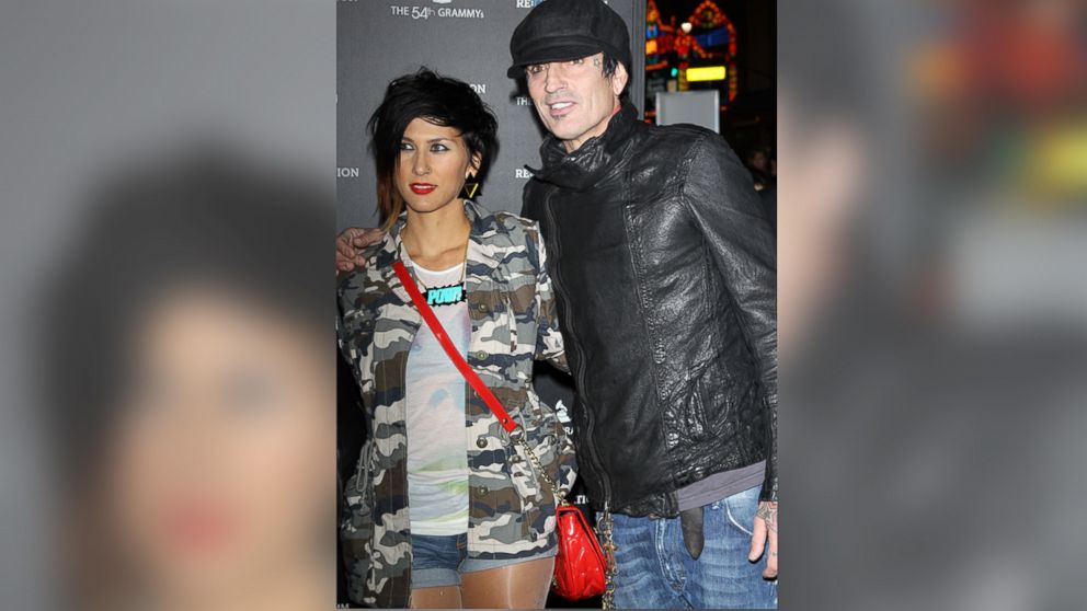 PHOTO: Tommy Lee, right, and girlfriend, Sofia Toufa arrive at the Los Angeles premiere of Re:Generation Music Project in this Feb. 9, 2012, file photo.