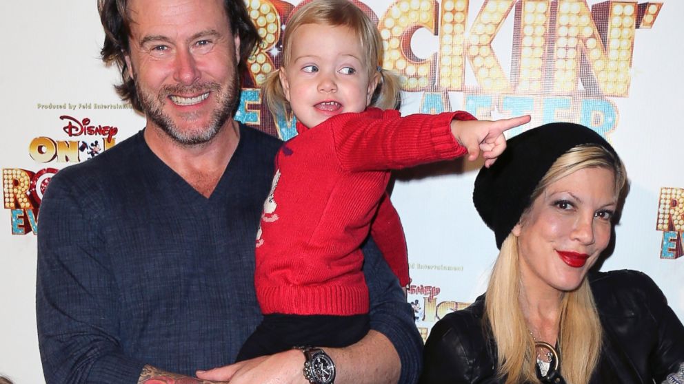 PHOTO: Dean McDermott and Tori Spelling pose with daughter Hattie Margaret McDermott