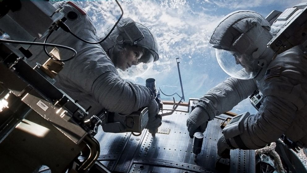 PHOTO: Sandra Bullock, left, as Dr. Ryan Stone and George Clooney as Matt Kowalsky in "Gravity."
