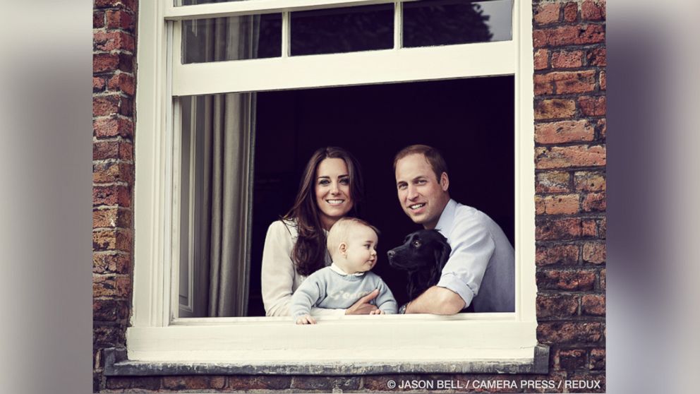 PHOTO: The Duke and Duchess of Cambridge with their son Prince George and dog Lupo photographed at Kensington Palace, London, March 2014.