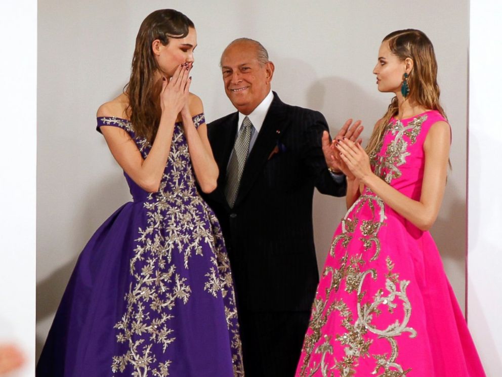 PHOTO: Designer Oscar De La Renta smiles with model Karlie Kloss and another model after presenting his Autumn/Winter 2013 collection during New York Fashion Week, Feb. 12, 2013.
